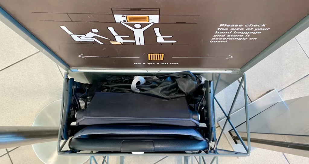 Bugaboo Butterfly in a carry-on size measurement device at the airport